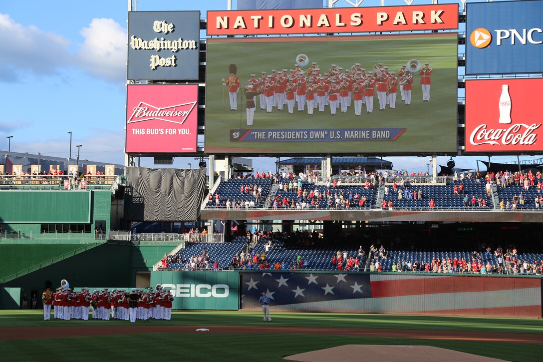 On July 25, 2017, the U.S. Marine Band performed the National Anthem at Nationals Park in Washington, D.C. for U.S. Marine Corps Day. Baritone vocalist Master Sgt. Kevin Bennear sang "God Bless America" at the seventh-inning stretch. (U.S. Marine Corps photo by Master Sgt. Amanda Simmons/released)