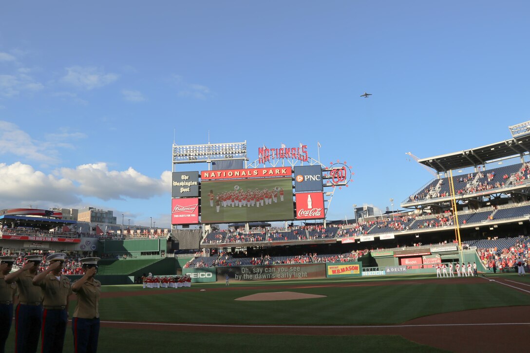 On July 25, 2017, the U.S. Marine Band performed the National Anthem at Nationals Park in Washington, D.C. for U.S. Marine Corps Day. Baritone vocalist Master Sgt. Kevin Bennear sang "God Bless America" at the seventh-inning stretch. (U.S. Marine Corps photo by Master Sgt. Amanda Simmons/released)