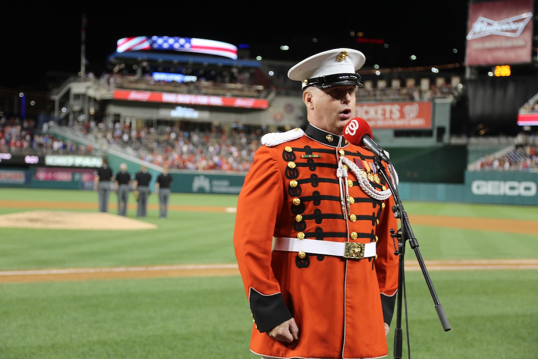 On July 25, 2017, the U.S. Marine Band performed the National Anthem at Nationals Park in Washington, D.C. for U.S. Marine Corps Day. Baritone vocalist Master Sgt. Kevin Bennear sang "God Bless America" at the seventh-inning stretch. (U.S. Marine Corps photo by Master Sgt. Amanda Simmons/released)