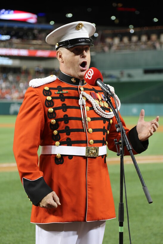 On July 25, 2017, the U.S. Marine Band performed the National Anthem at Nationals Park in Washington, D.C. for U.S. Marine Corps Day. Baritone vocalist Master Sgt. Kevin Bennear sang "God Bless America" at the seventh-inning stretch. (U.S. Marine Corps photo by Master Sgt. Amanda Simmons/released)