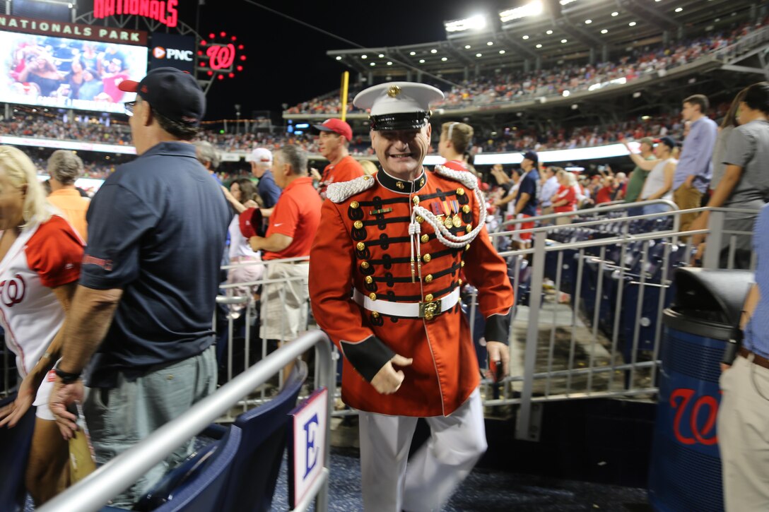 On July 25, 2017, the U.S. Marine Band performed the National Anthem at Nationals Park in Washington, D.C. for U.S. Marine Corps Day. Baritone vocalist Master Sgt. Kevin Bennear sang "God Bless America" at the seventh-inning stretch. (U.S. Marine Corps photo by Master Sgt. Amanda Simmons/released)