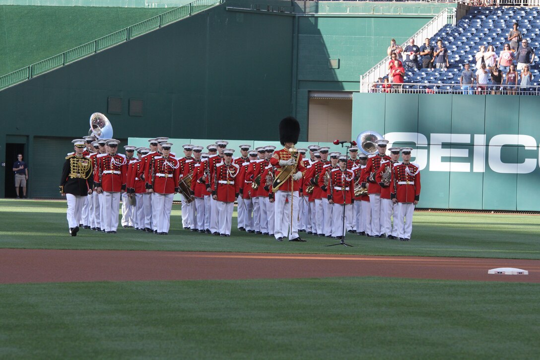 On July 25, 2017, the U.S. Marine Band performed the National Anthem at Nationals Park in Washington, D.C. for U.S. Marine Corps Day. Baritone vocalist Master Sgt. Kevin Bennear sang "God Bless America" at the seventh-inning stretch. (U.S. Marine Corps photo by Master Sgt. Amanda Simmons/released)