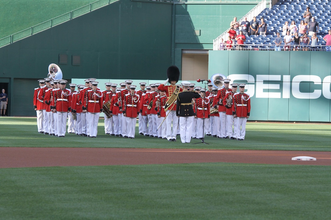 On July 25, 2017, the U.S. Marine Band performed the National Anthem at Nationals Park in Washington, D.C. for U.S. Marine Corps Day. Baritone vocalist Master Sgt. Kevin Bennear sang "God Bless America" at the seventh-inning stretch. (U.S. Marine Corps photo by Master Sgt. Amanda Simmons/released)