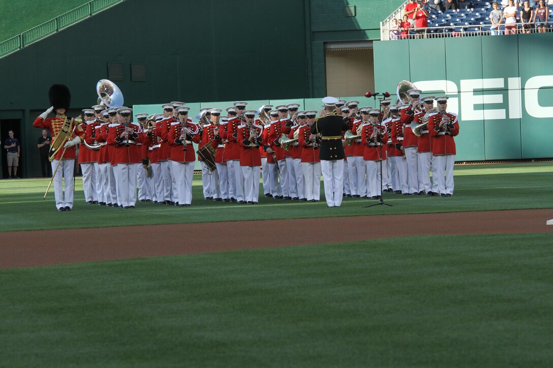 On July 25, 2017, the U.S. Marine Band performed the National Anthem at Nationals Park in Washington, D.C. for U.S. Marine Corps Day. Baritone vocalist Master Sgt. Kevin Bennear sang "God Bless America" at the seventh-inning stretch. (U.S. Marine Corps photo by Master Sgt. Amanda Simmons/released)