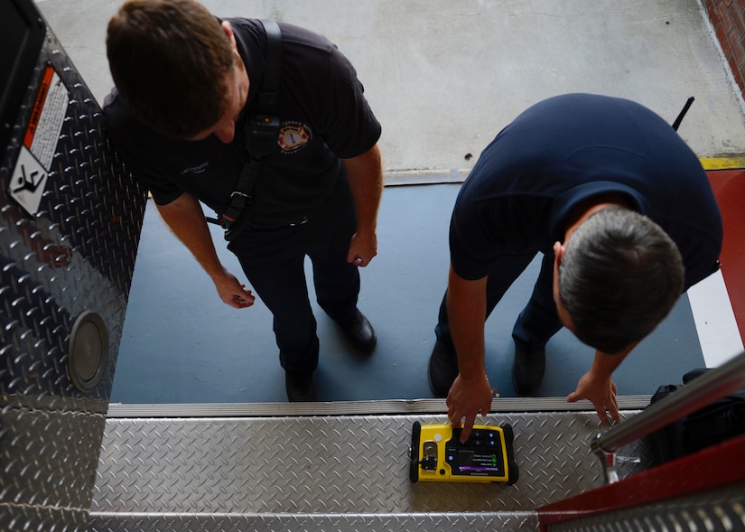(From left) Lt. Peter Taylor, Fort Eustis Fire and Emergency Services lead firefighter, looks on as Tim Ketterman, Fort Eustis and Emergency Services firefighter and HAZMAT specialist, uses the HazMatID Elite chemical identifier to perform a test on an unknown substance, at Joint Base Langley-Eustis, Va., July 20, 2017. Firefighters from Fort Eustis train with Langley Air Force Base’s emergency management and bio-environmental personnel every two months to help ensure they respond properly to HAZMAT incidents. (U.S. Air Force photo/Airman 1st Class Kaylee Dubois)