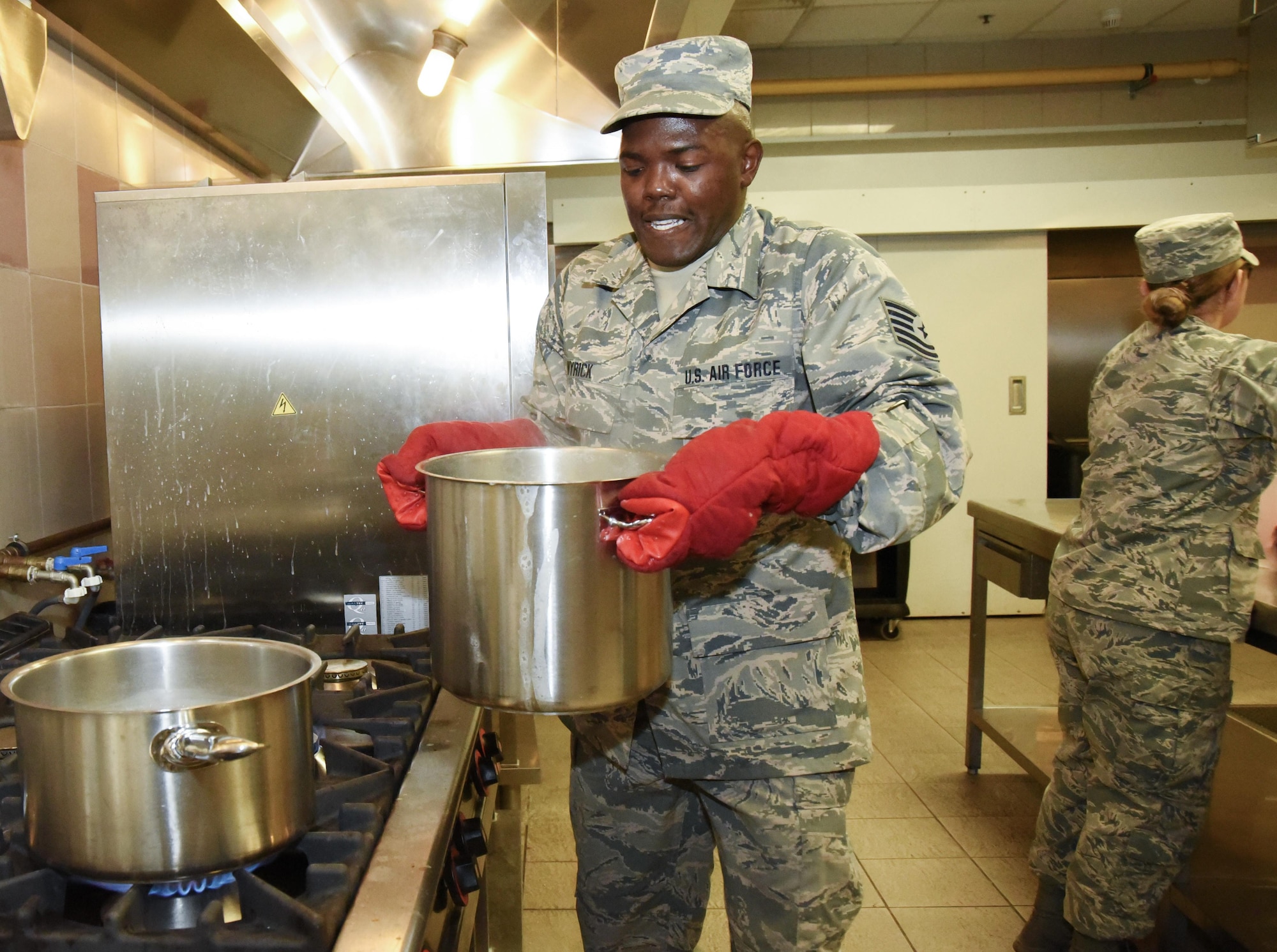 AVIANO AIR BASE, Italy -- Tech. Sgt. Brandon Wyrick, a 301st Fighter Wing Force Support Squadron food service technician, prepares to strain a fresh pot of spaghetti from boiling water and take it to the serving line at La Dulce Vida Dining Facility at Aviano Air Base, Italy.  Working stations during their annual tour included food preparation, cooking, baking, serving on the line, fruit bar, salad bar, cashier, beverages, dishes and clean-up to name a few. (U.S. Air Force photo by Tech. Sgt. Jeremy Roman)