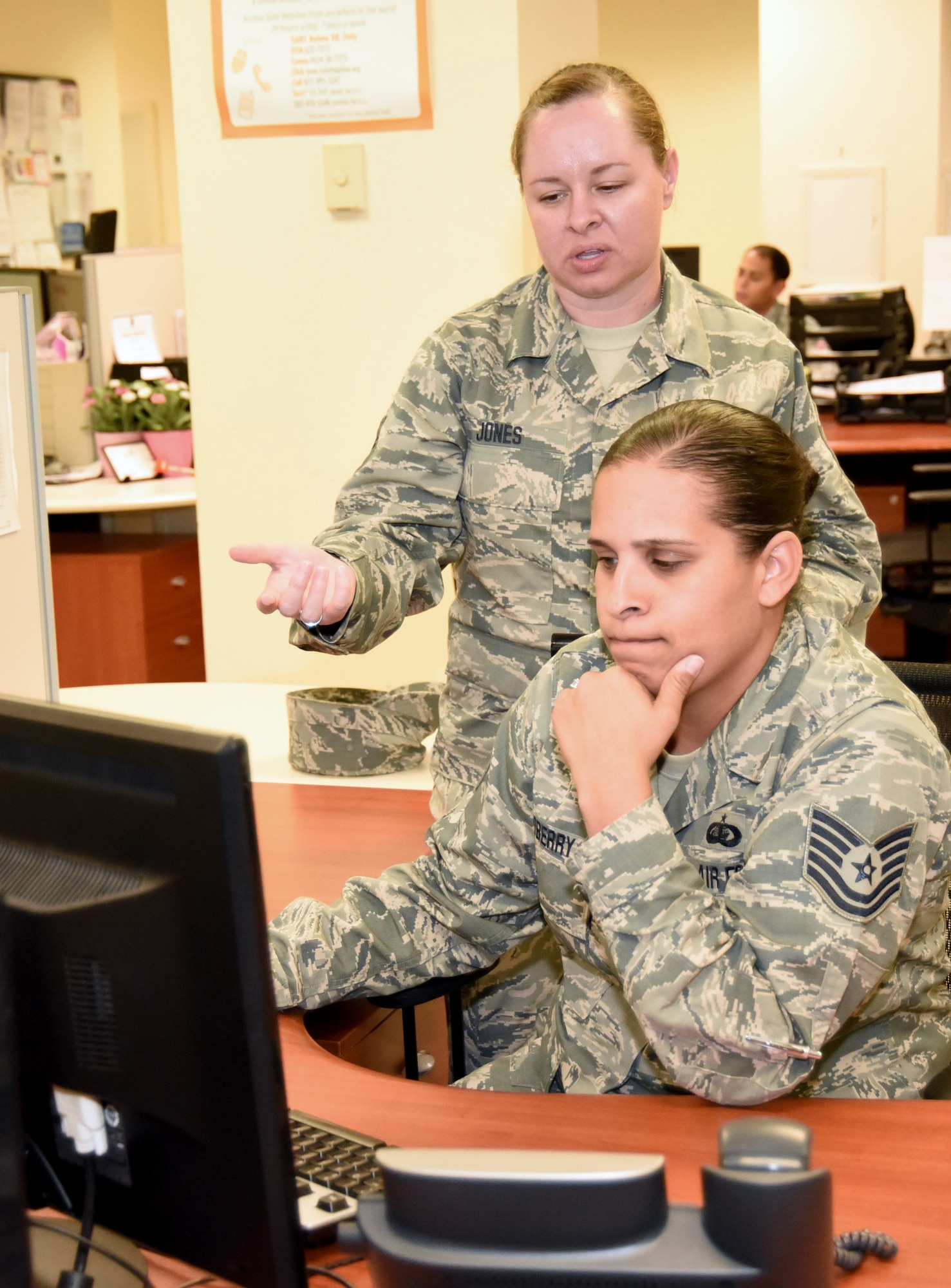 AVIANO AIR BASE, Italy -- Master Sgt. Veronica Jones, a military personnel section training manager NCO in charge, and Tech. Sgt. Christina Sadberry, customer support NCO in charge, at the 301st Fighter Wing Force Support Squadron from Naval Air Station Fort Worth Joint Reserve Base, Texas complete training for their annual tour requirement at the 31st Fighter Wing MPS office, Aviano Air Base, Italy. Training opportunities like this allow for Airmen, both active duty and reserve, to be trainers and learners which helps them to be better prepared to work side-by-side in deployed environments. (U.S. Air Force photo by Tech. Sgt. Jeremy Roman)