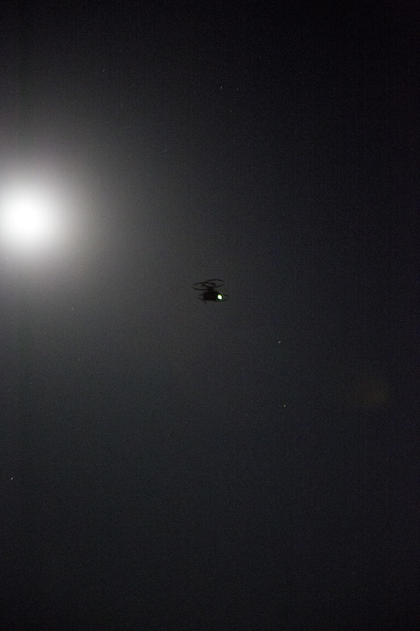 A Joint Tactical Aerial Resupply Vehicle (JTARV) flies through the night with cargo it retrieved from a Marine Special Operations Team (MSOT) with 1st Marine Raider Support Battalion, U.S. Marine Corps Forces, Special Operations Command, aboard Marine Corps Base Camp Pendleton, Calif., July 11. The JTARV, which is in the developmental phase, is a lightweight autonomous vehicle which provides an aerial resupply capability for immediate support to operational units. It was being tested as a resupply platform for machine-gun sustainment training with a cargo unmanned logistics system (C-ULS) during their TRX.