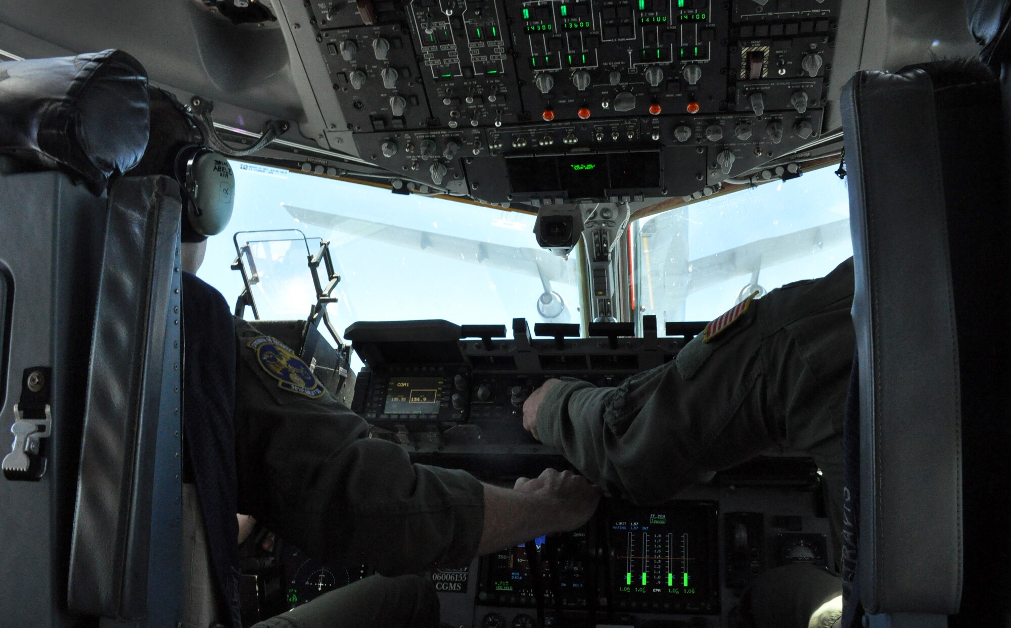 Majs. Matthew Abele and Malcom Westberry, both 301st Airlift Squadron C-17 Globemaster III pilots, close in on a KC-10 Extender during an in-air refueling over northern California on July 22, 2017. The aircraft, both from Travis Air Force Base, Calif., were performing training flights in conjunction with the 349th Air Mobility Wing's Patriot Wyvern exercise. (U.S. Air Force photo by Senior Airman Shelby R. Horn/Released)