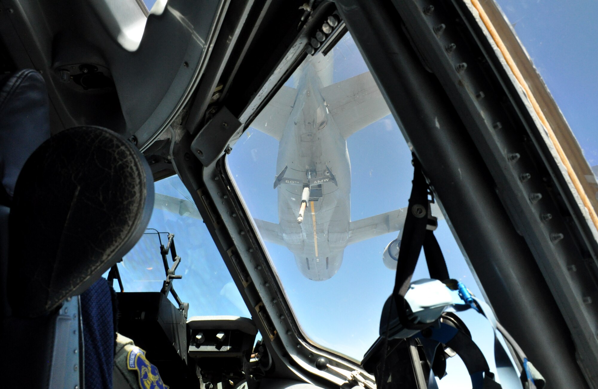 A C-17 Globemaster III approaches a KC-10 Extender during an in-air refueling over northern California on July 22, 2017. The aircraft, both from Travis Air Force Base, Calif., were performing training flights in conjunction with the 349th Air Mobility Wing's Patriot Wyvern exercise. (U.S. Air Force photo by Senior Airman Shelby R. Horn/Released)