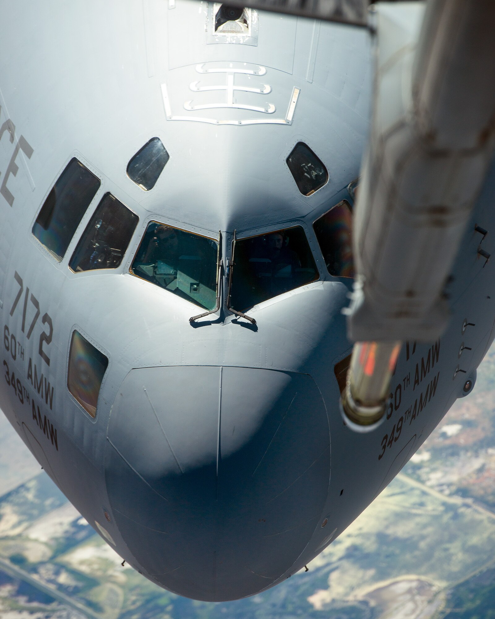 A C-17 Globemaster III from the 301st Airlift Squadron, 349th Air Mobility Wing, Travis Air Force Base, Calif., is refueled by a KC-10 Extender, July 20, 2017. The C-17 Globemaster III was conducting a local training mission in Northern California. (U.S. Air Force photo Louis Briscese)