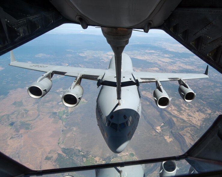 A C-17 Globemaster III from the 301st Airlift Squadron, 349th Air Mobility Wing, Travis Air Force Base, Calif., is refueled by a KC-10 Extender, July 20, 2017. The C-17 Globemaster III was conducting a local training mission in Northern California. (U.S. Air Force photo Louis Briscese)