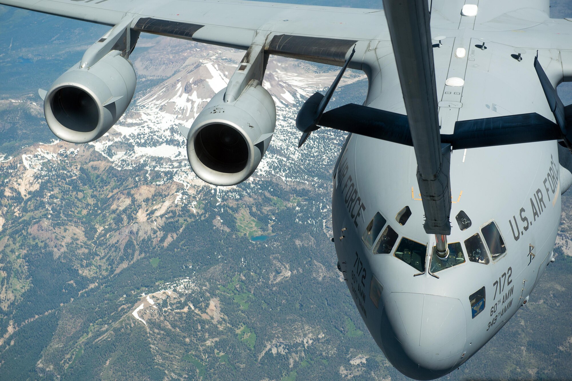 A C-17 Globemaster III from the 301st Airlift Squadron, 349th Air Mobility Wing, Travis Air Force Base, Calif., is refueled by a KC-10 Extender, July 20, 2017. The C-17 Globemaster III was conducting a local training mission in Northern California. (U.S. Air Force photo Louis Briscese)