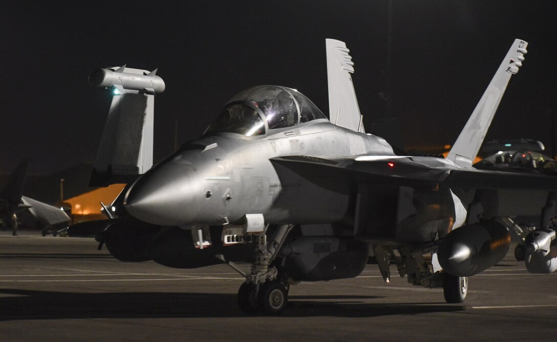 An EA-18G Growler from the Electronic Attack Squadron 134, Naval Air Station Whidbey Island, Wash., prepares for takeoff of at Nellis Air Force Base, Nev., during Red Flag 17-3, July 14, 2017. The Growler is an Airborne Electronic Attack aircraft that integrates electronic attack technology, including jamming pods, communication countermeasures and satellite communications. (U.S. Air Force photo by Senior Airman Dustin Mullen/Released)