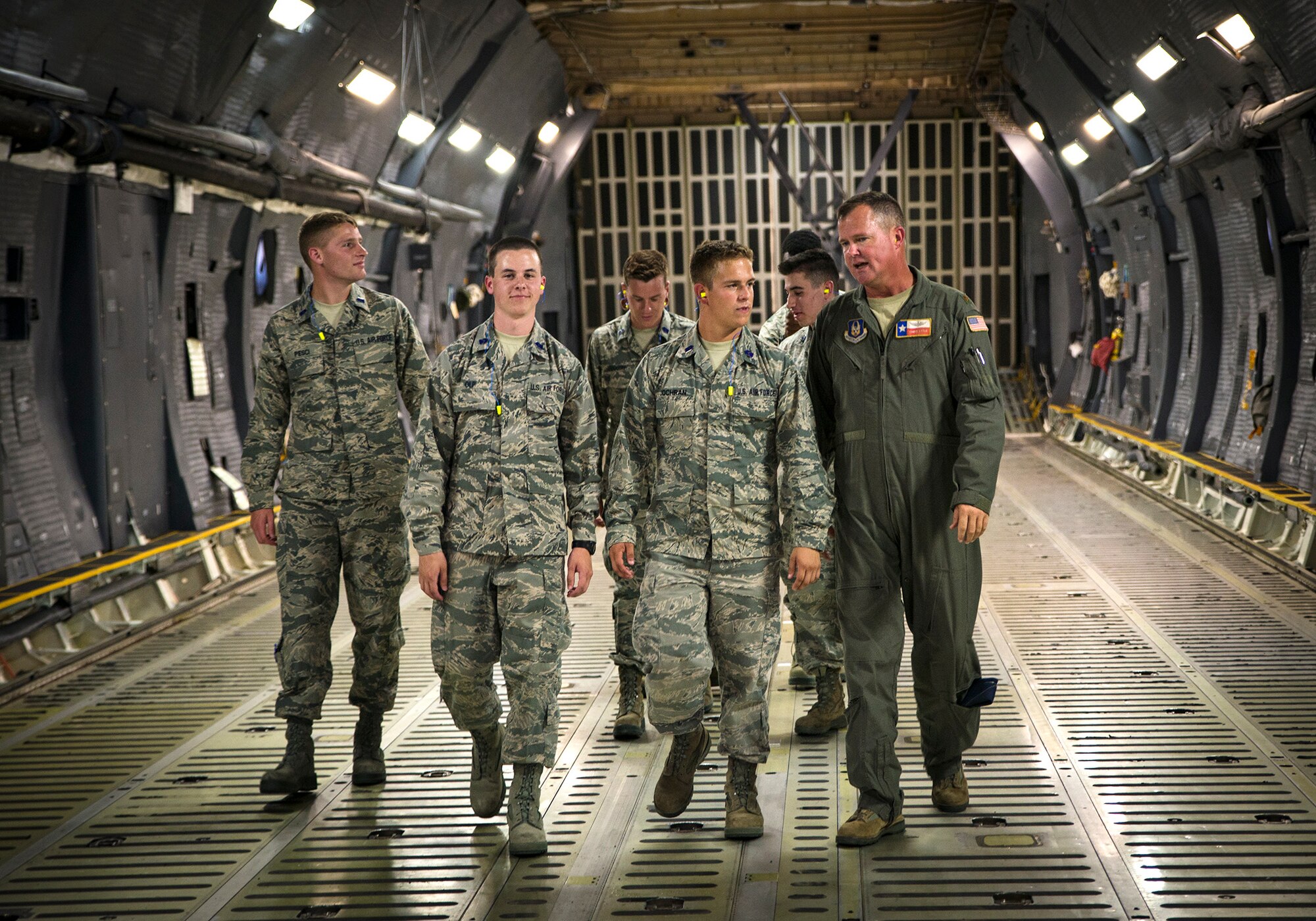 Maj. Chris Lytle, 68th Airlift Squadron C-5M pilot, shows Reserve Officer Training Corps cadets the cargo hold of a C-5M Super Galaxy July 26, 2017, at Joint Base San Antonio-Lackland.  (U.S. Air Force photo by Benjamin Faske)