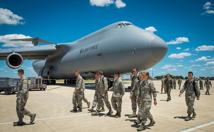 Reserve Officer Training Corps cadets tour a C-5M Super Galaxy aircraft at the 433rd Airlift Wing July 26, 2017, at Joint Base San Antonio-Lackland, Texas. The cadets also visited the engine shop and flew in the C-5 flight simulator at the 733rd Training Squadron. (U.S. Air Force photo by Benjamin Faske)
