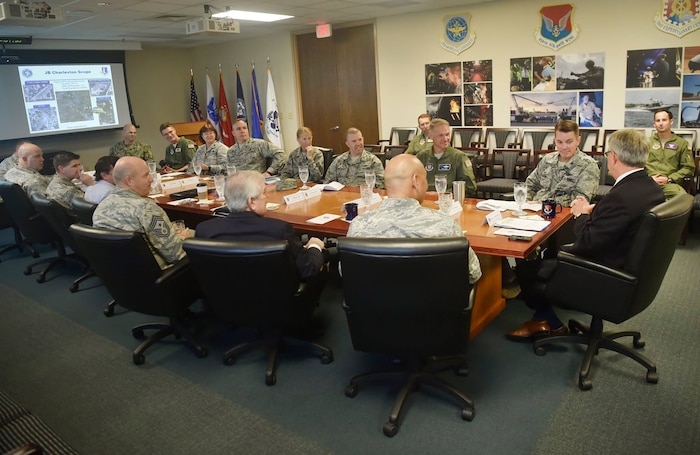 Charleston Mayor John Tecklenburg, right, speaks to Joint Base Charleston leadership during a joint base mission briefing as part of a site visit here, July 25. The locations Tecklenburg toured included the Naval Health Clinic Charleston, the Naval Nuclear Power Training Command and the 841st Transportation Battalion. Tecklenburg was selected to represent the installation at the Joint Civilian Orientation Conference in August 2017. The mission of JCOC is to increase public understanding of national defense by enabling American business and community leaders to directly observe and engage with the U.S. military. 