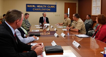 Charleston Mayor John Tecklenburg, center, speaks to Joint Base Charleston leadership during a joint base mission briefing inside the Naval Health Clinic Charleston here, July 25. The locations Tecklenburg toured included Naval Health Clinic Charleston, the Naval Nuclear Power Training Command and the 841st Transportation Battalion. Tecklenburg was selected to represent the installation at the Joint Civilian Orientation Conference in August 2017. The mission of JCOC is to increase public understanding of national defense by enabling American business and community leaders to directly observe and engage with the U.S. military. 