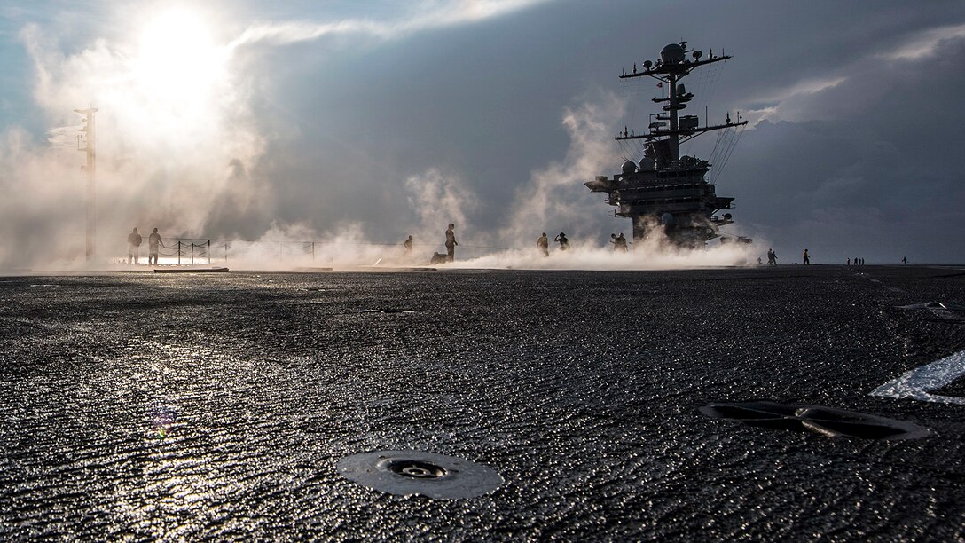 Sailors test a catapult on the flight deck of the USS Harry S. Truman as the aircraft carrier conducts sea trials in the Atlantic Ocean, July 24, 2017. Navy photo by Seaman Kaysee Lohmann