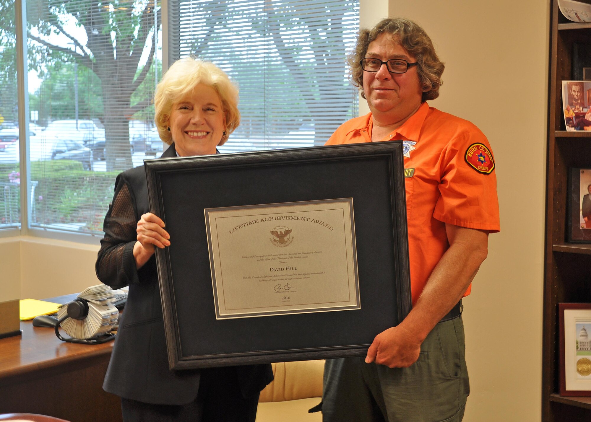 David Hill receiving his “Call to Service Award,” from California State Senator Jean Fuller in May. The award is a lifetime achievement award that is part of the President’s Volunteer Service Award Program. (Courtesy photo by Rick Buckreis)