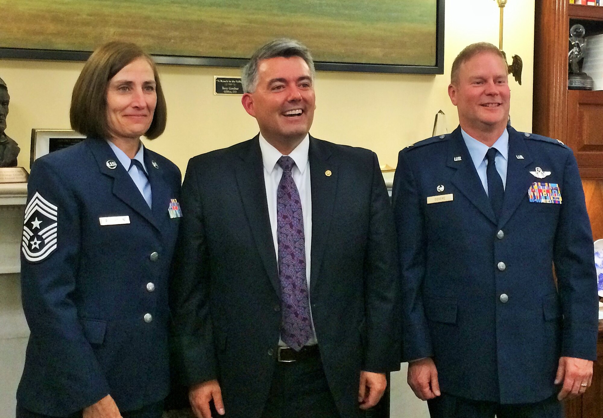 Col. James DeVere, 302nd Airlift Wing commander, and Chief Master Sgt. Vicki Robertson, 302nd AW command chief, stand with Colorado Senator Cory Gardner at the Capitol Hill offices in Washington D.C. June 14, 2017. The visit was among the five congressional visits that took place in June. (U.S. Air Force photo/Ann Skarban)