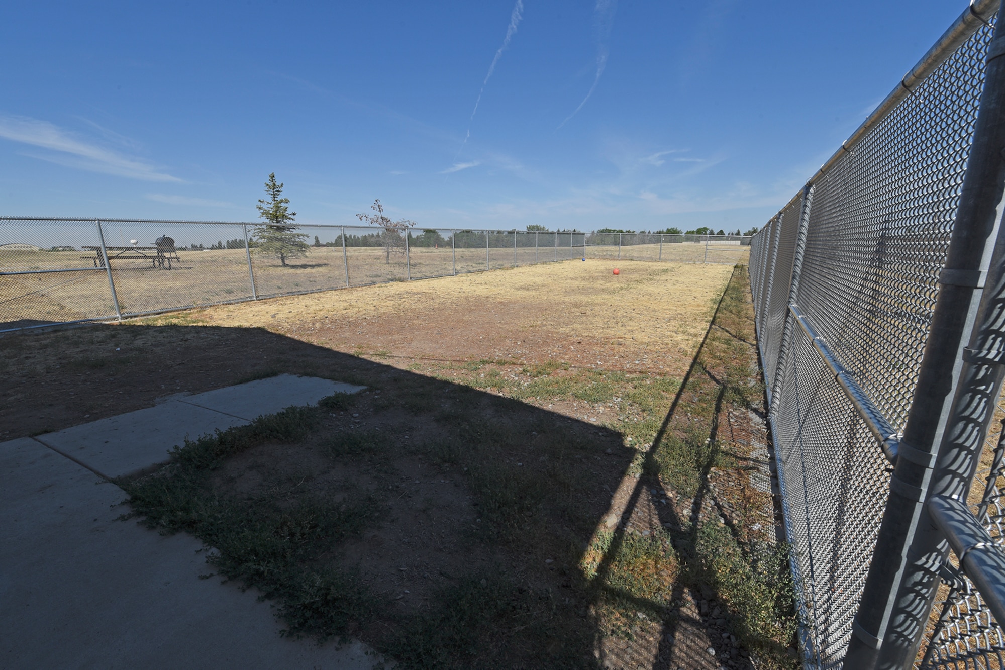 Construction for the 92nd Security Forces Squadron Military Working Dog kennels began in mid-July, breaking ground on the $1.7 million project. While construction is underway, the MWDs and handlers have relocated to Tanker Tails, a base kennel used for boarding and caring for family pets. (U.S. Air Force photo/Senior Airman Mackenzie Richardson)

