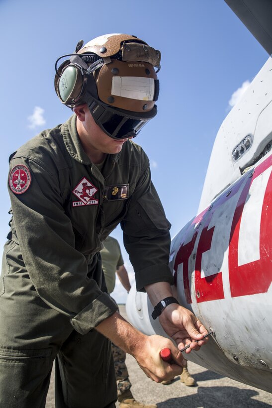 U.S. Marine Corps Cpl. Cole Moore, a powerline mechanic with Marine Fighter Attack Squadron (VMFA) 232, secures storage on an F/A-18C Hornet at JASDF Hyakuri Air Base, Japan, July 24, 2017. Maintenance keeps aircraft in a constant state of preparedness to enhance operational readiness and mission accomplishment. This is the first time that VMFA-232 has been to JASDF Hyakuri Air Base, which gave the local Japanese forces the ability to simulate air-to-air maneuvers with dissimilar aircraft. (U.S. Marine Corps photo by Lance Cpl. Mason Roy)