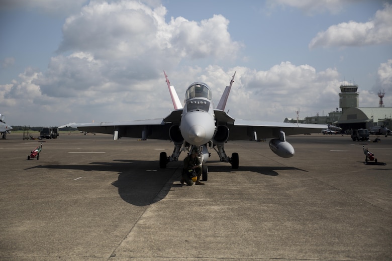 An U.S. Marine Corps F/A-18C Hornet with Marine Fighter Attack Squadron (VMFA) 232 sits ready to depart Japan Air Self-Defense Force (JASDF) Hyakuri Air Base, and return to Marine Corps Air Station (MCAS) Iwakuni, Japan, July 24, 2017. VMFA-232 conducted exercises with the JASDF as part of the Aviation Training Relocation program, which is designed to increase operational readiness and interoperability between U.S. and Japanese forces, and to reduce the overall noise impact across Japan by dispersing bilateral jet-fighter training of U.S. forces across a multitude of different JASDF bases (U.S. Marine Corps photo by Lance Cpl. Mason Roy)