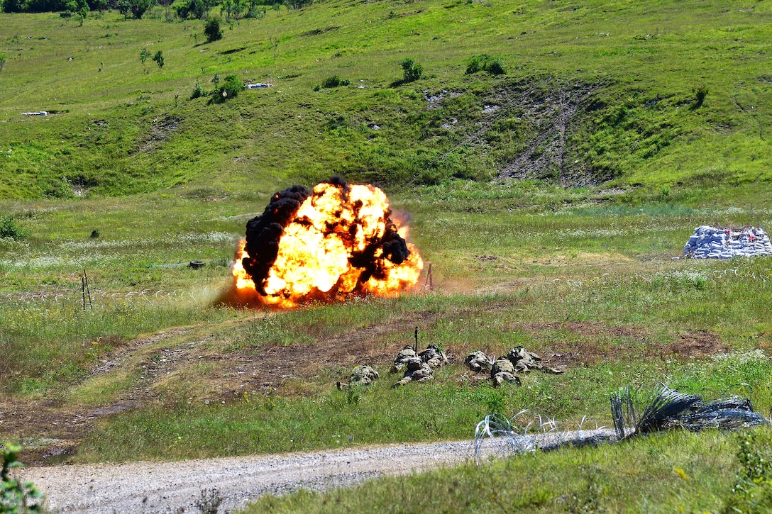 Paratroopers open a breach during a live-fire exercise as part of Exercise Rock Knight at Pocek Range in Postonja, Slovenia, July 25, 2017. The paratroopers are assigned to the 2nd Battalion, 503rd Infantry Regiment, 173rd Airborne Brigade. Exercise Rock Knight is a bilateral training exercise between U.S. and the Slovenian armed forces, focused on small-unit tactics and building on previous lessons learned, forging the bonds and enhancing readiness between allied forces. Army photo by Davide Dalla Massara