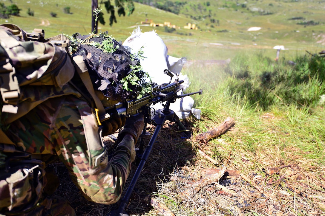 A paratrooper engages targets during a live-fire exercise as part of Exercise Rock Knight at Pocek Range in Postonja, Slovenia, July 25, 2017. Army photo by Davide Dalla Massara