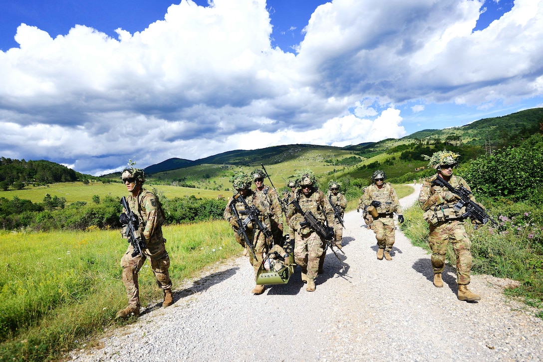 Paratroopers conduct casualty evacuation training during a live-fire exercise as part of Exercise Rock Knight at Pocek Range in Postonja, Slovenia, July 25, 2017. Army photo by Davide Dalla Massara