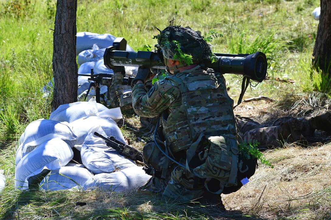 Paratroopers fire a machine gun and operate a shoulder-launched rocket during a live-fire exercise as part of Exercise Rock Knight at Pocek Range in Postonja, Slovenia, July 25, 2017. Army photo by Paolo Bovo
