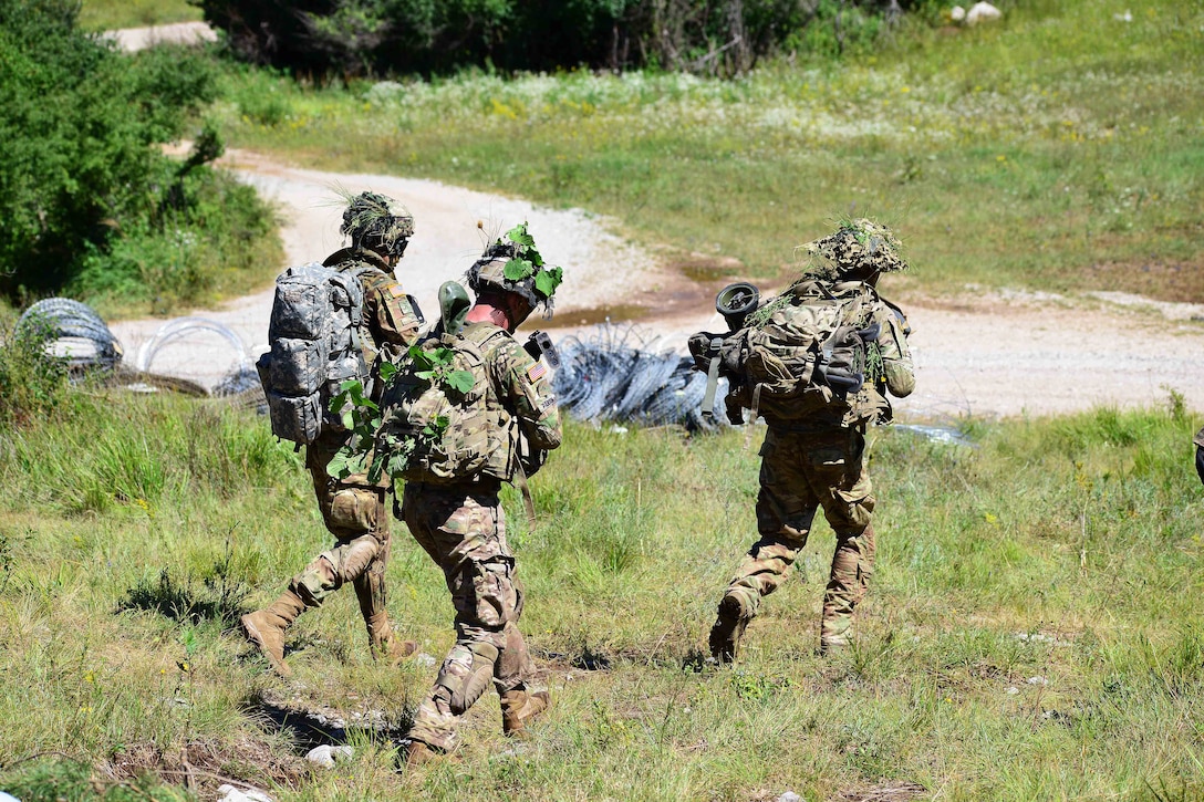 Paratroopers advance toward their follow-on objective during a live-fire exercise as part of Exercise Rock Knight at Pocek Range in Postonja, Slovenia, July 25, 2017. Army photo by Paolo Bovo