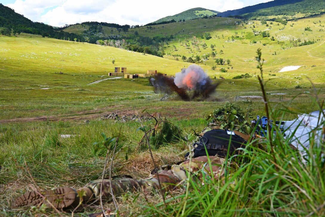 Paratroopers detonate an explosive charge to destroy a wire obstacle during a live-fire exercise as part of Exercise Rock Knight at Pocek Range in Postonja, Slovenia, July 25, 2017. Army photo by Paolo Bovo
