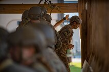 Staff Sgt. Luis Dominguez, 823d Base Defense Squadron close precision engagement team member, practices exiting an aircraft during a static-line jump, July 21, 2017, at Moody Air Force Base, Ga. This training was in preparation for an upcoming mission readiness exercise where airmen serve as an airborne advanced team, with the mission to create an initial presence and clear a path for follow-on forces to arrive on scene. (U.S. Air Force photo by Airman 1st Class Daniel Snider)