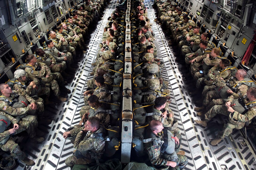 Soldiers wait inside a C-17 Globemaster III aircraft before participating in a static line parachute jump during Exercise Panther Storm at Fort Bragg, N.C., July 24, 2017. Air Force photo by Staff Sgt. Andrew Lee