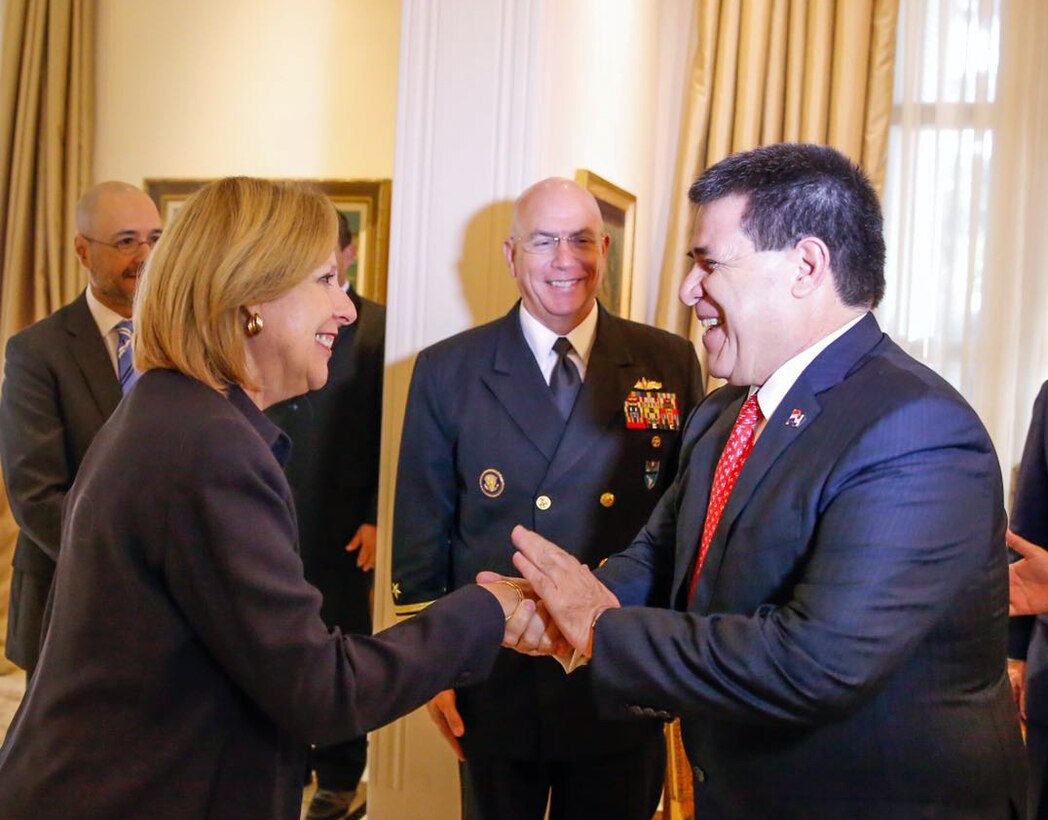 ASUNCIÓN, Paraguay -- Paraguayan President Horacio Cartés greets Amb. Liliana Ayalde, U.S. Southern Command Civilian Deputy to the Commander, at the Palacio de los López. Ayalde traveled with U.S. Navy Adm. Kurt W. Tidd, commander of U.S. Southern Command, to Paraguay to meet the nation's leaders and to engage with senior regional security officials during the annual Fuerzas Comando multinational special operations skills competition. (Photo courtesy of the Office of the President of Paraguay)