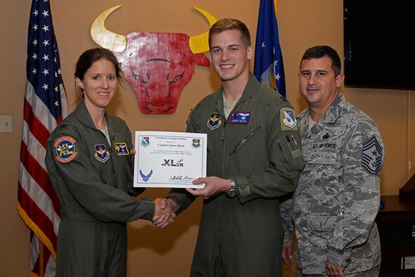 Capt. James Bloch, 87th Flying Training Squadron instructor pilot, was chosen by wing leadership to be this week’s “XLer,” July 12. The “XLer” award, presented by Col. Michelle Pryor, 47th Flying Training Wing vice commander, and Chief Master Sgt. George Richey, 47th FTW command chief, is given to those who consistently make outstanding contributions to their unit, and Laughlin’s mission.
