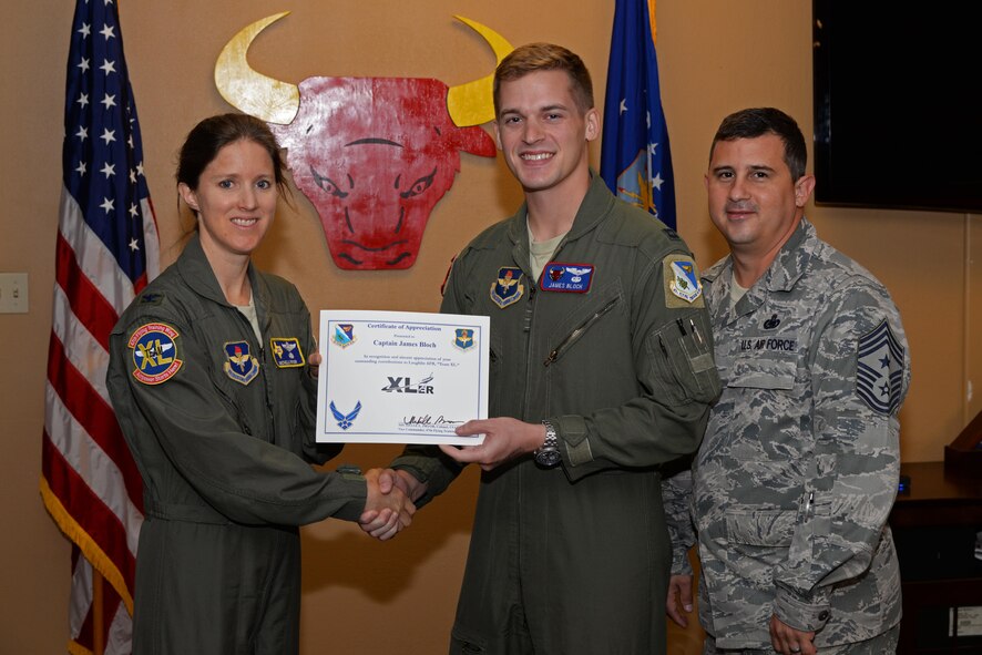 Capt. James Bloch, 87th Flying Training Squadron instructor pilot, was chosen by wing leadership to be this week’s “XLer,” July 12. The “XLer” award, presented by Col. Michelle Pryor, 47th Flying Training Wing vice commander, and Chief Master Sgt. George Richey, 47th FTW command chief, is given to those who consistently make outstanding contributions to their unit, and Laughlin’s mission.
