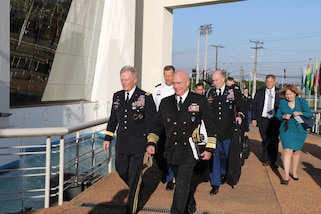 ASUNCIÓN, Paraguay (July 24, 2017)-- U.S. Navy Adm. Kurt W. Tidd, commander of U.S. Southern Command, and U.S. Special Operations Command commander, Army Gen. Raymond Thomas III, talk while en route to the Fuerzas Comando 2017 Senior Leader Seminar opening ceremony in Asunción, Paraguay. Both leaders were in Paraguay to participate in the seminar, observe the competition and discuss defense ties with Paraguay’s armed forces. (Photo by Jose Ruiz, SOUTHCOM Public Affairs)