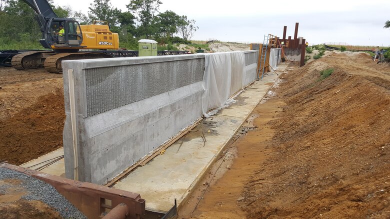 A concrete floodwall is being constructed to help reduce flooding as part of the  Port Monmouth Flood Risk Management Project in Port Monmouth, New Jersey. 