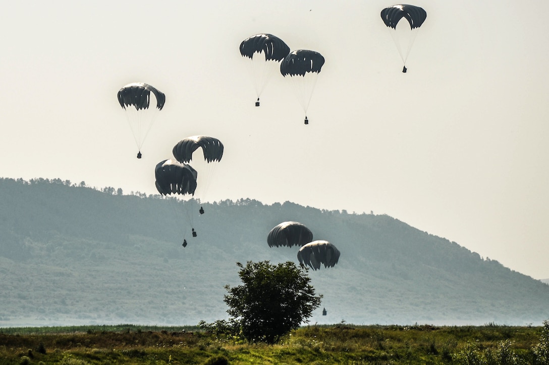Soldiers conduct a heavy equipment airborne operation during Exercise Saber Guardian 17 in Turzii, Romania, July 21, 2017. The soldiers are assigned to the 1st Battalion, 143rd Infantry Regiment 173rd Airborne Brigade. Saber Guardian is a U.S. Army Europe-led, multinational exercise that spans across Bulgaria, Hungary and Romania with more than 25,000 participating troops from 22 allied and partner nations. Army photo by Sgt. David Vermilyea