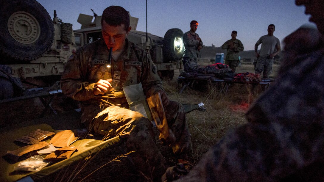 Soldiers prepare their cots for sleep during a combat support training exercise at Fort Hunter Liggett, Calif., July 22, 2017. The soldiers are military police reservists assigned to the 56th Military Police Company. Army Reserve photo by Master Sgt. Michel Sauret