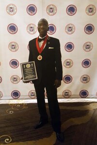 Surrounded by his wife, Carolynn, son Harold III and close friends, retired Air Force Master Sgt. Harold Cherry Cherry was named “Competitor of the Year” during his induction ceremony July 22 at the Hilton San Antonio Airport Hotel. 