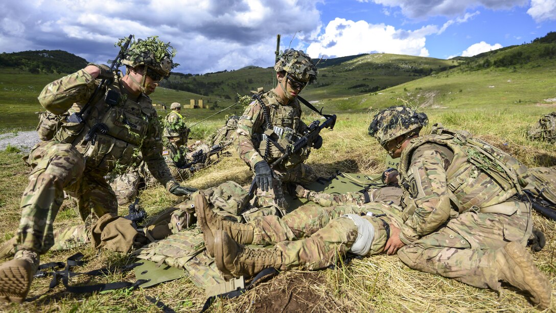 Soldiers conduct tactical combat casualty care during a live-fire exercise as part of Exercise Rock Knight at Pocek Range in Postojna, Slovenia, July 25, 2017. Exercise Rock Knight is a bilateral training exercise between the U.S. Army’s 173rd Airborne Brigade and the Slovenian Armed Forces focusing on small-unit tactics and enhancing readiness. Army photo by Davide Dalla Massara