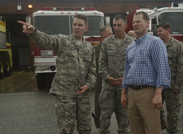 Col. Jeff Nelson, left, 628th Air Base Wing commander, Lt. Col. Christopher Carnduff, center, 628th Civil Engineer Squadron commander and Lt. Gov. of South Carolina Kevin Bryant, right, look out toward rows of C-17 Globemaster IIIs on Joint Base Charleston’s flightline, during a visit here July 26. Bryant toured Joint Base Charleston to meet and thank military and civilian first responders for their service to the country and their efforts to support the local community. Bryant toured a C-17 Globemaster III, the installation fire department and received hands-on equipment familiarization from 628th CES explosive ordinance disposal team Airmen. (U.S. Air Force photo by Staff Sgt. Christopher Hubenthal)