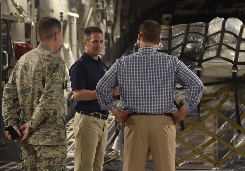 Kenneth Hundemer, center, 437th Aerial Port Squadron, briefs Lt. Gov. of South Carolina Kevin Bryant, right, and Col. Jeff Nelson, left, 628th Air Base Wing commander, during a tour of a C-17 Globemaster III as part of a visit here, July 26. Bryant toured Joint Base Charleston to meet and thank military and civilian first responders for their service to the country and their efforts to support the local community. Bryant toured a C-17 Globemaster III, the installation fire department and received hands-on equipment familiarization from 628th Civil Engineer Squadron explosive ordinance disposal team Airmen. (U.S. Air Force photo by Staff Sgt. Christopher Hubenthal)