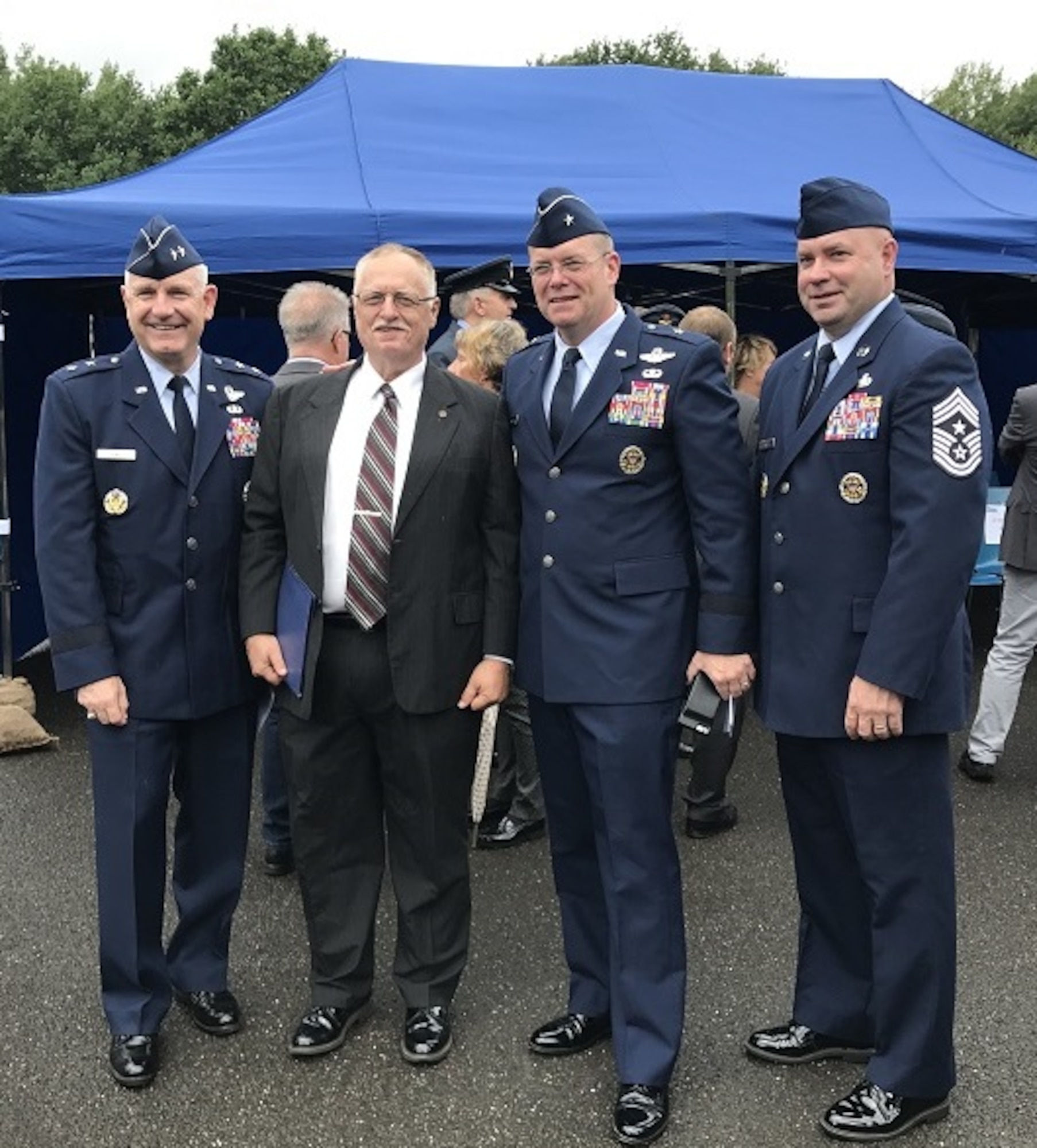 Maj. Gen. Timothy Fay, vice commander U.S. Air Forces in Europe, Dr. Silvano Wueschner, Air University historian, Brig. Gen. Richard G. Moore, commander 86 Airlift Wing and Chief Master Sgt. Aaron D. Bennett, 86 Airlift Wing command, pose for a photo before the dedication of memorial for Royal Air Force Squadron leader Roger Bushell and French Air Force 2nd Lt. Bernad Scheidhauer, July 1, 2017, outside Ramstein, Germany.  Both men were part of the “Great Escapees,” who were executed by the Gestapo on March 29, 1944 near present-day Ramstein Air Base. (U.S. Air Force photo by Staff Sgt. Timothy Moore)