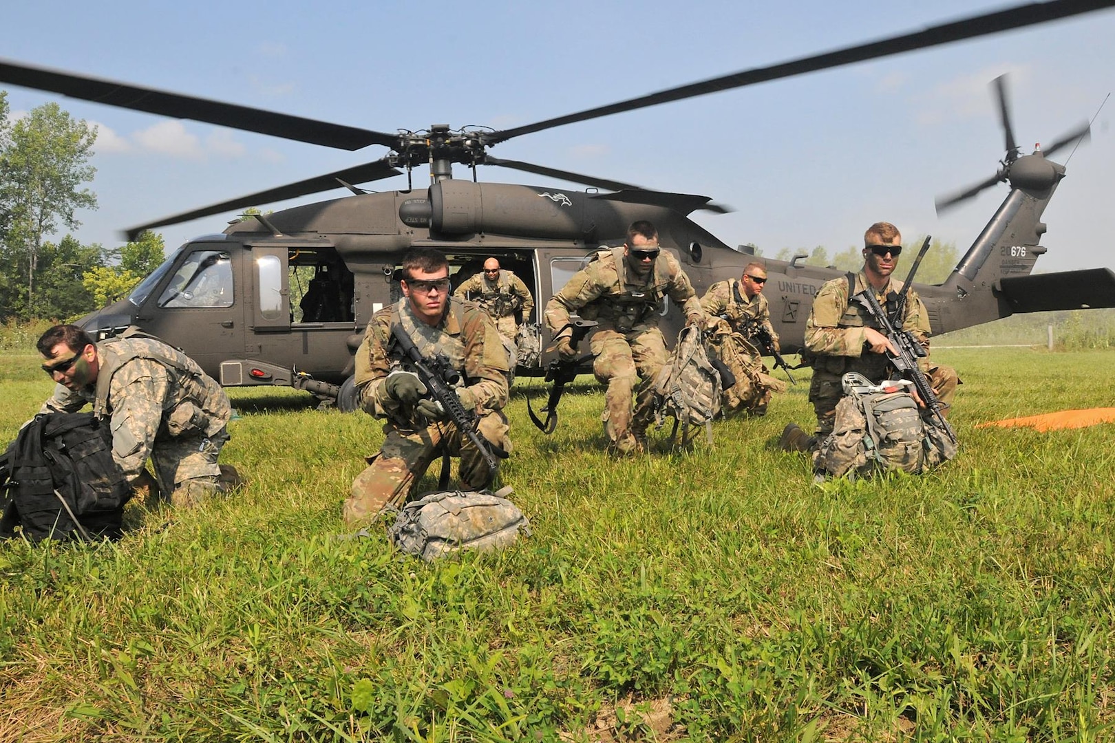 Soldiers with the 1st Battalion, 149th Infantry and 1123rd Engineer Company conduct a combined arms air assault exercise at Camp Atterbury, Ind., July 18, 2017.
