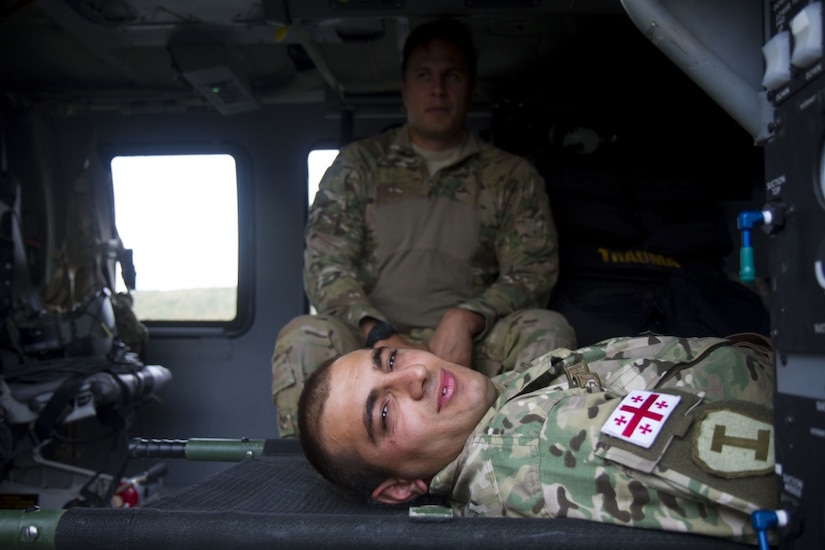 The 3-10 General Support Aviation Battalion, 10th Combat Aviation Brigade, and 421st Multifunctional Medical Battalion, 30th Medical Brigade, train Greek, Georgian and U.S. soldiers on litter carrying and loading and unloading of patients on medical evacuation assets at Novo Selo Training Area, Bulgaria during Saber Guardian 17, July 17, 2017. Army Reserve photo by Capt. Jeku Arce